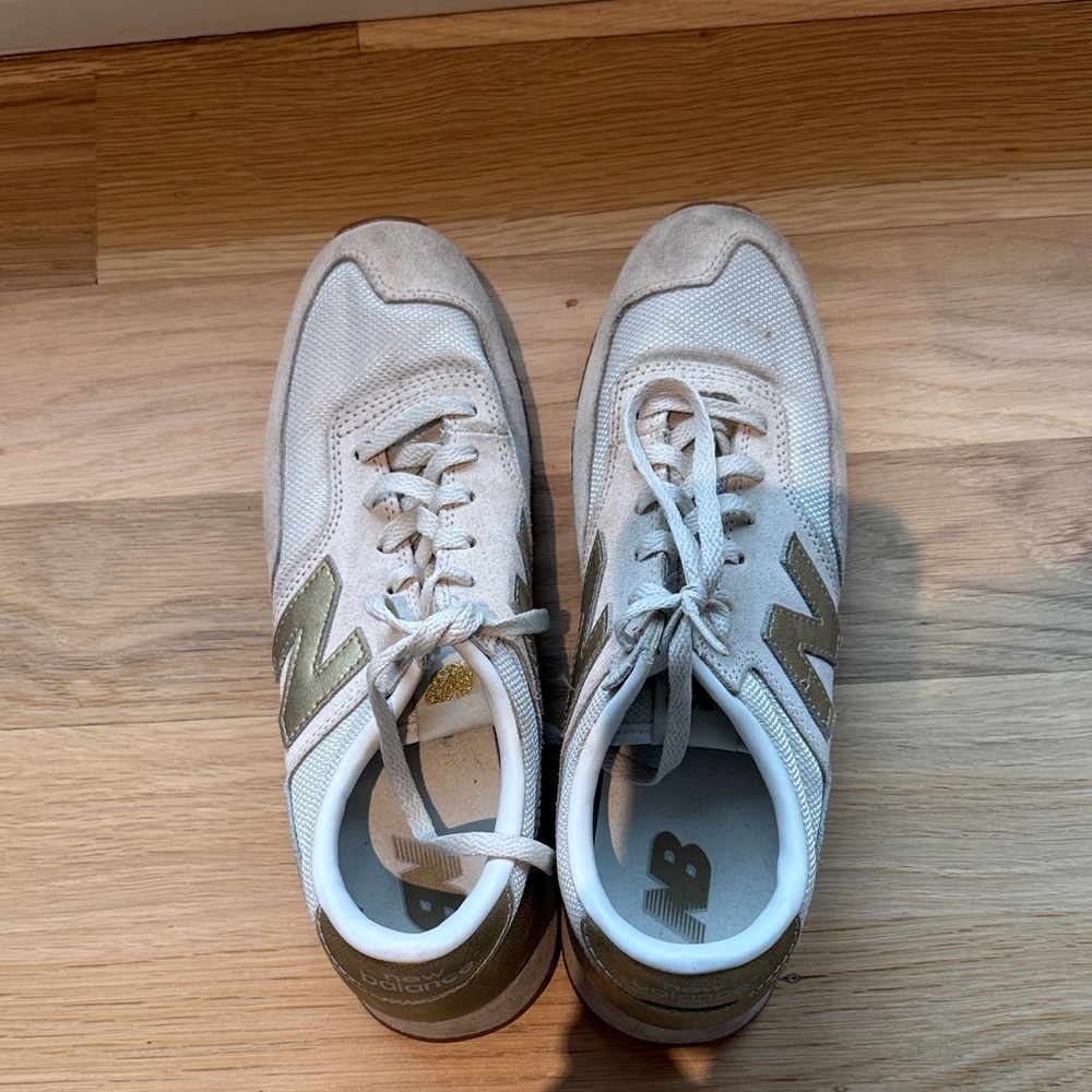 New Balance White and Gold Athletic Shoes